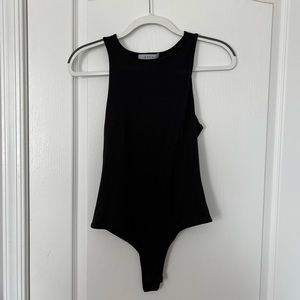 Black bodysuit in a size small by Gaze for sale